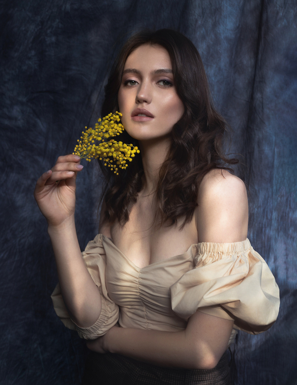 Tender feminine photoshoot with mimosa tree flowers